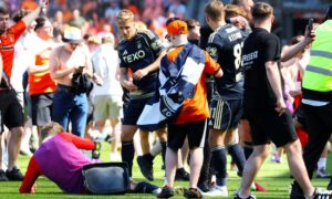 Jack McKenzie hit with seat