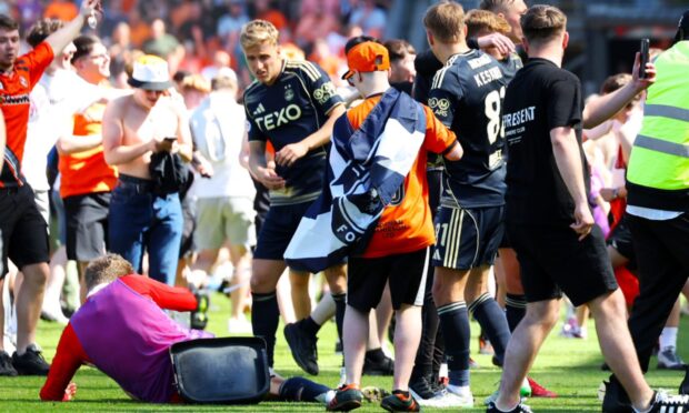 Jack McKenzie hit with seat