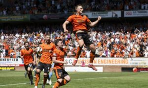 Jumping for joy: Dalby fired United to 4th.