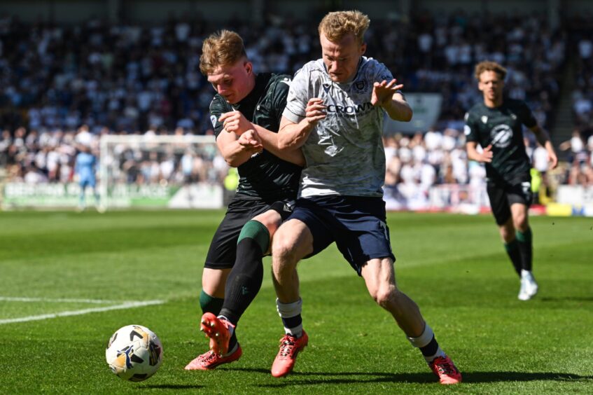 Fran Franczak battles Scott Tiffoney for the ball.