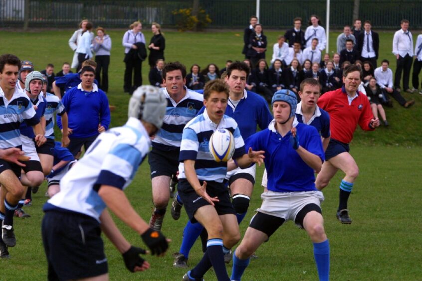  a pass during the match between side from All Saints Anglican School played against Perth Academy.