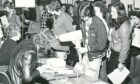 Image shows: a black and white picture of students enrolling for their classes at Stirling University.