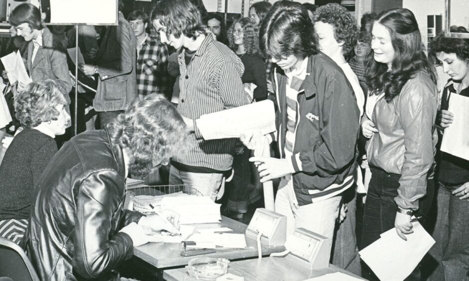 Image shows: a black and white picture of students enrolling for their classes at Stirling University.