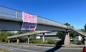The sign is on the bridge over the Kingsway, near Old Glamis Road. Image: Ellidh Aitken/DC Thomson
