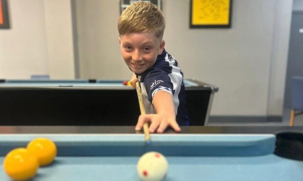 Luka Britton, 8, was named youngest ever champion