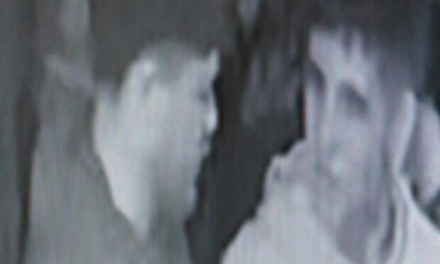 CCTV footage of two men.