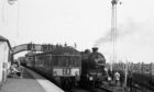 Number 64602 alongside the Edinburgh train during a stop at Elie in 1965.