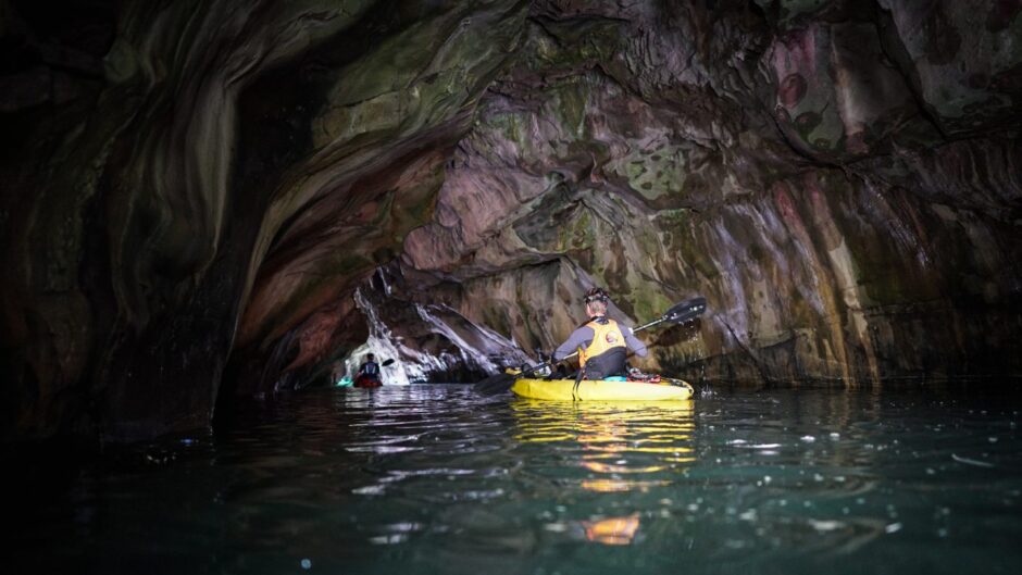 Kayaking at Arbroath cliffs.