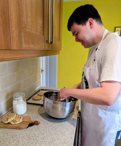 Aaron baking cookies