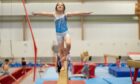 A young gymnast hones her skills at a previous Dundee holiday camp. Image: Leisure and Culture Dundee.