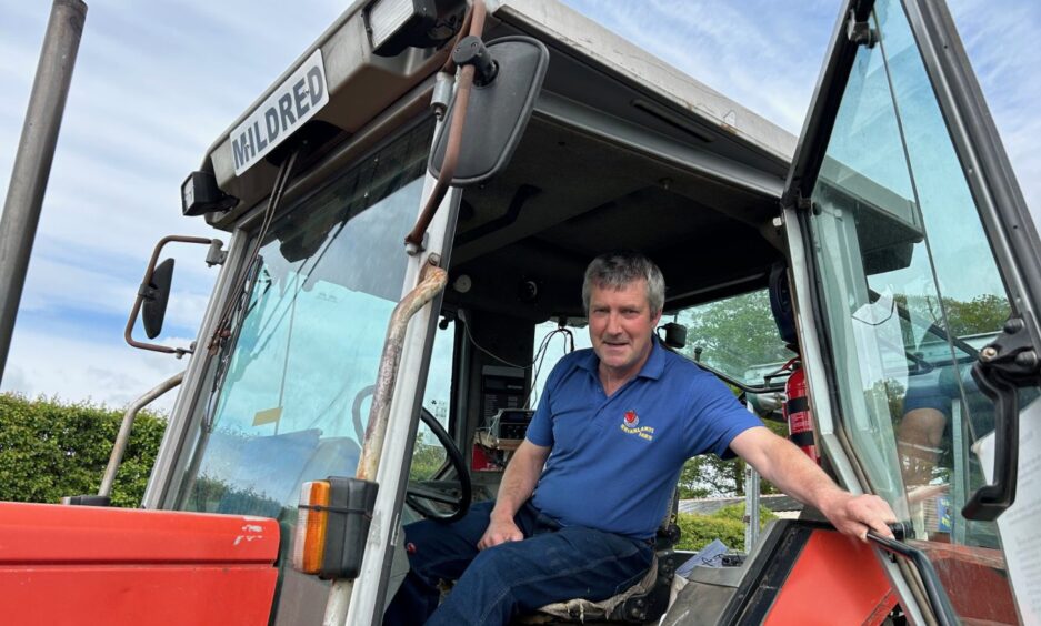 Briarlands Farm owner, farmer Robin Inglis, in Mildred the tractor