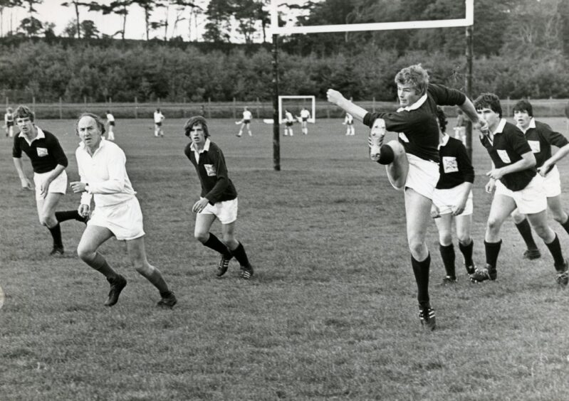A player kicking the ball during the game.