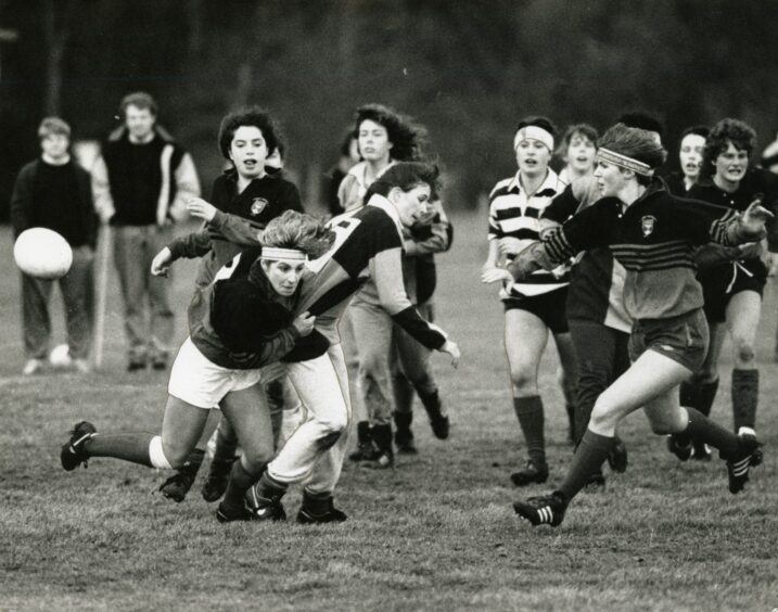 Players competing for the ball as Dundee University Ladies Rugby Club play St Andrews Ladies Rugby Club