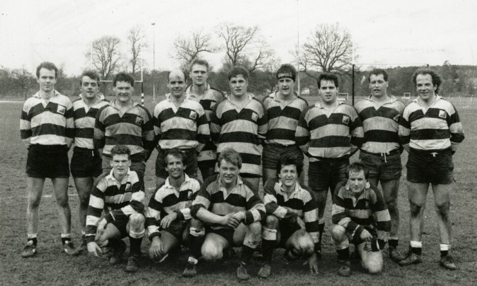 Perthshire Rugby Club line up for a team shot after winning the Division Four title in 1990.