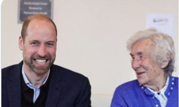 Chris Charlton chatting with Prince William in Forfar just weeks before her 100th birthday. Image: Prince and Princess of Wales/X