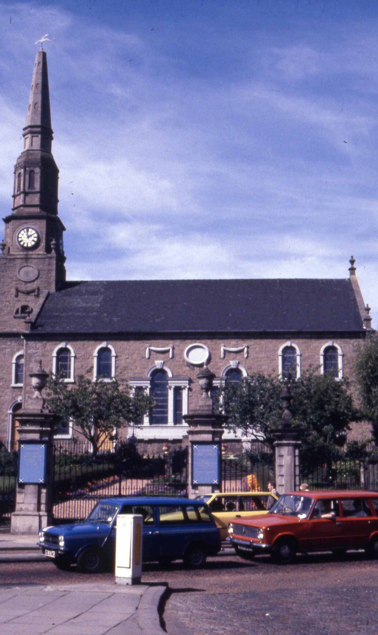 Cars parked along the pavement outside St Andrew's Church in King Street.