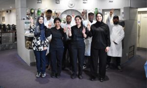 The team at Jahangir Tandoori celebrating their anniversary.