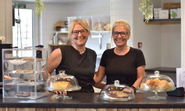 Two women posing for the camera