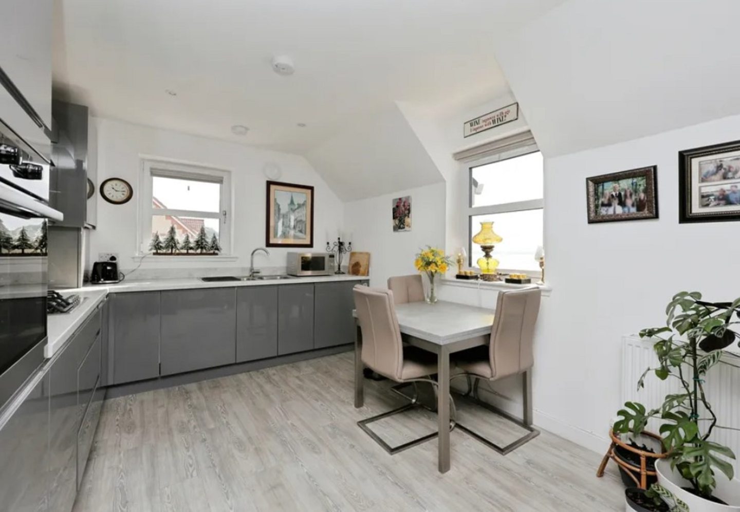 High-spec modern kitchen and dining area.