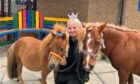 Drew Myres with haggis and squiggle the miniature shetland ponie