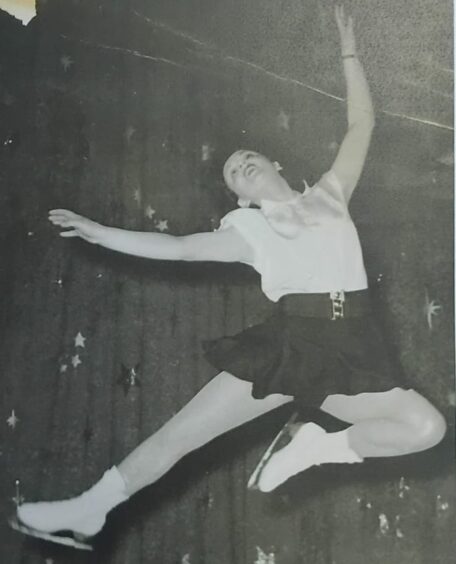 Kirkcaldy woman Ena McKinlay as a young woman, jumping on the air at the ice rink