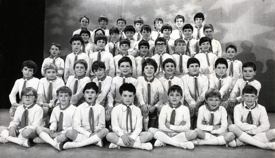 The Dundee Scout Gang Show cast on stage