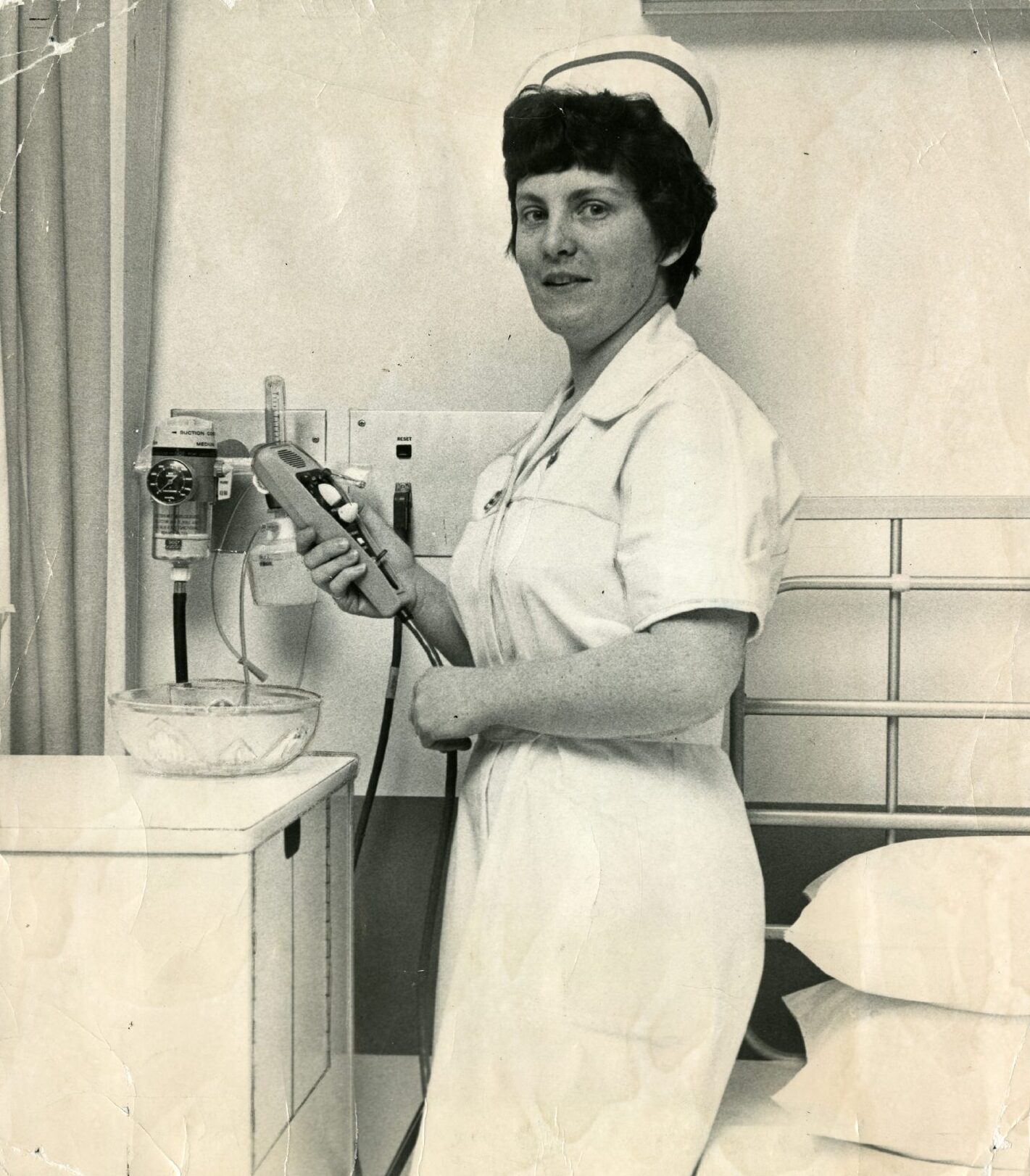 Nurse Phyllis Wellman shows off a radio handset in January 1974