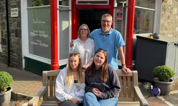 Strathtay Post Office owners Simon and Alison Gray with their daughters Erin and Rachel.