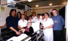 DRI final out-patient, Isabella Ivy, with nursing staff in November 1998.
