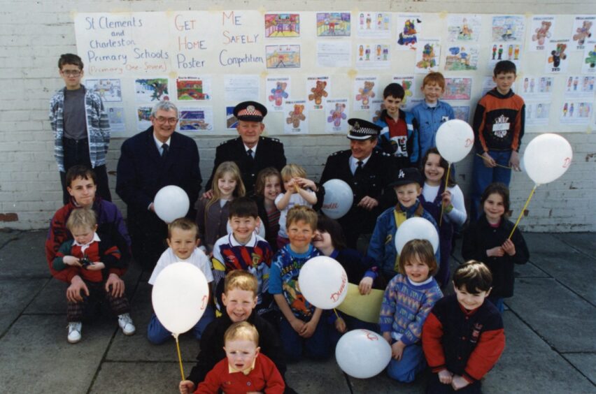 Kids pictured beside their posters at the beginning of Charleston Community Safety Week
