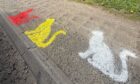Some of the cat art that has appeared on roadsides in Fife and caused fevered speculation.