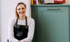 Lauren Houstoun smiling, wearing Glenkilrie Larder apron