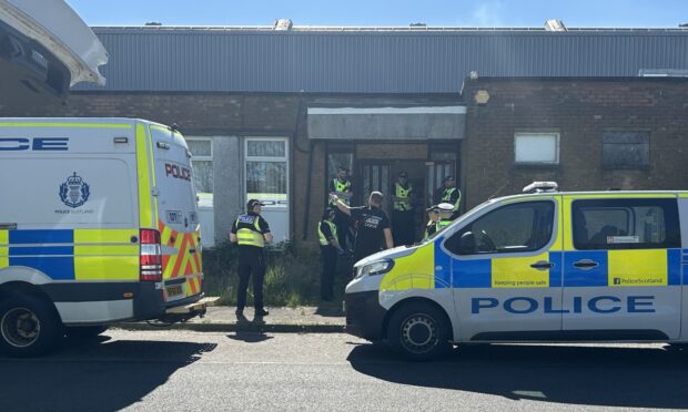 Police at the scene in Cowdenbeath. Image: Neil Henderson/DC Thomson