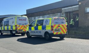 Police raid the factory at Gateside Industrial Estate in Cowdenbeath.