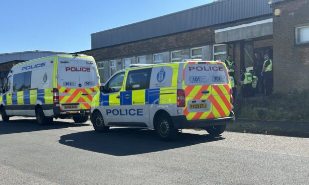 Police raid the factory at Gateside Industrial Estate in Cowdenbeath.