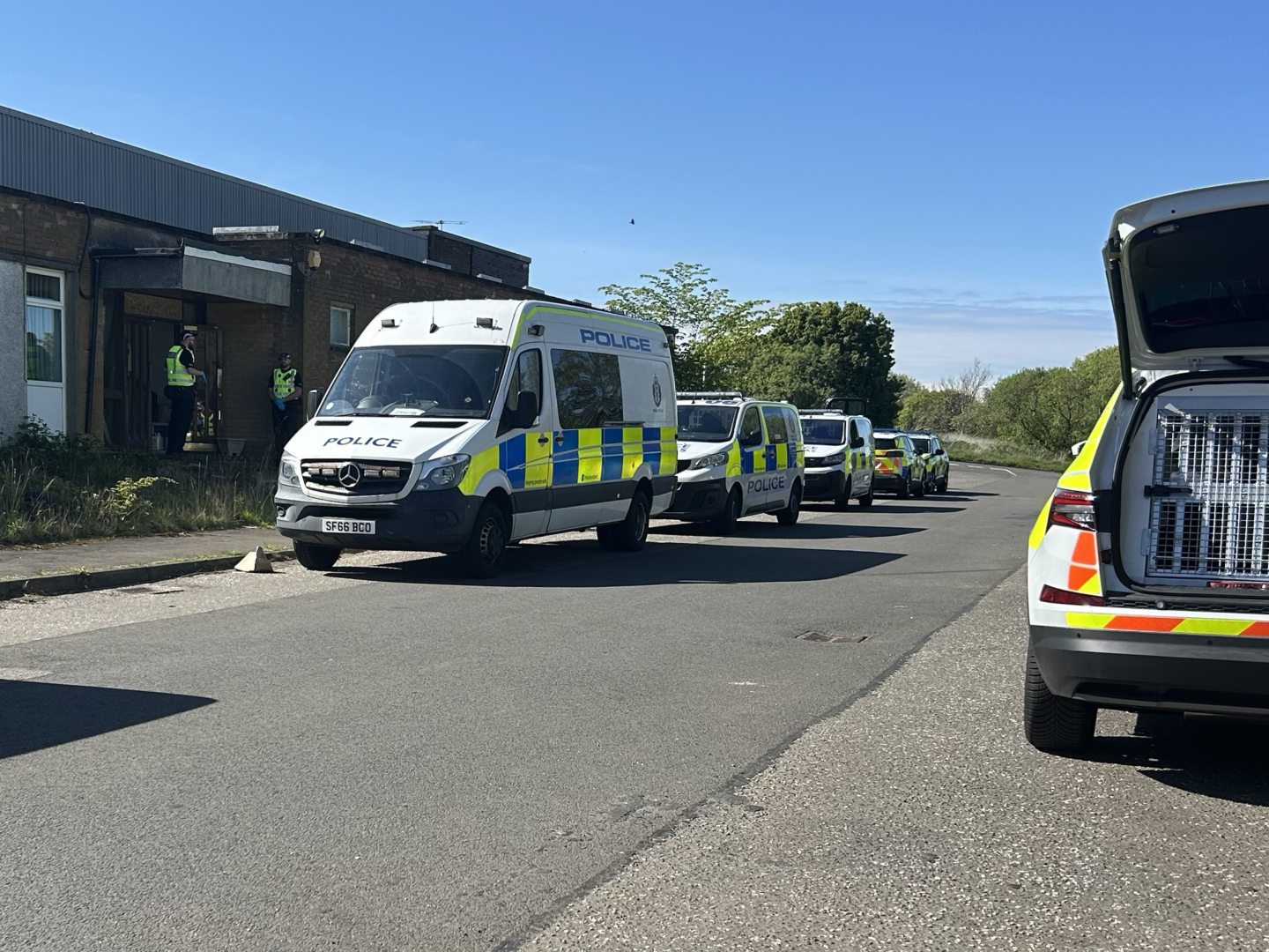 Police raid the building.