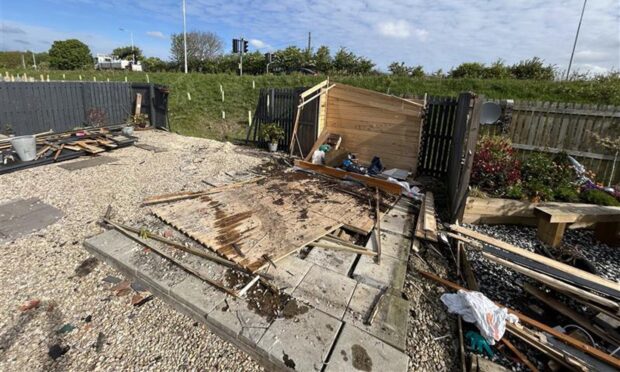 One of the three damaged gardens after the crash in Duloch in Dunfermline.