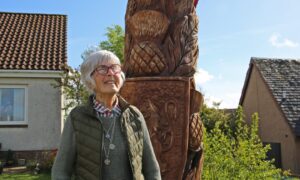 Isabell MacDiarmid says her neighbours are as fond of her totem pole as she is. Image: Alex Watson/DC Thomson