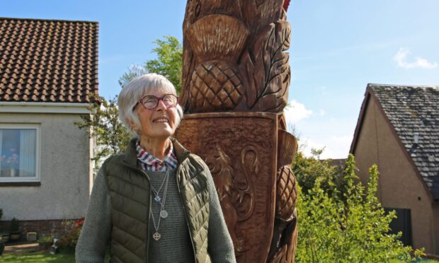 Isabell MacDiarmid says her neighbours are as fond of her totem pole as she is. Image: Alex Watson/DC Thomson