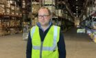 Joe Wall in The Cress Company's Dunfermline warehouse