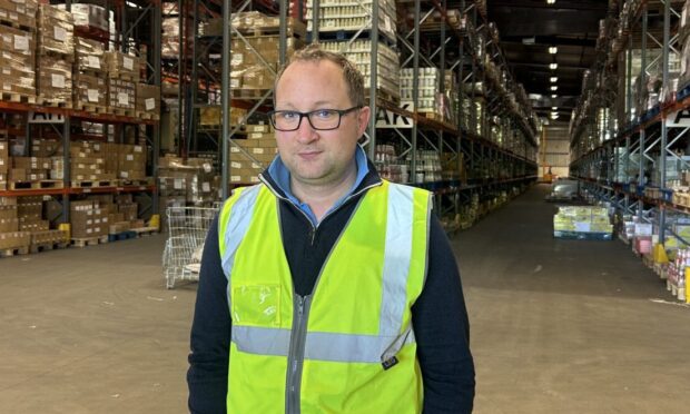 Joe Wall in The Cress Company's Dunfermline warehouse