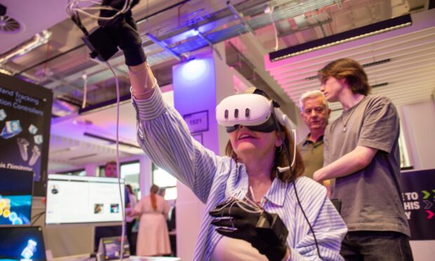 Lesley Laverty enjoyed a hands on experience with a VR programme. Image: Kim Cessford/Dc Thomson.
