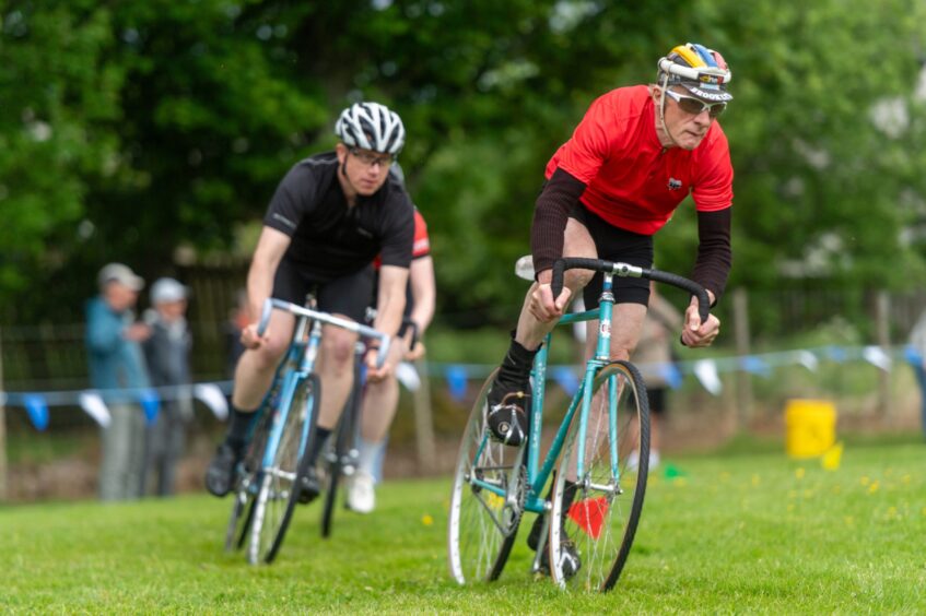two cyclists racing 
