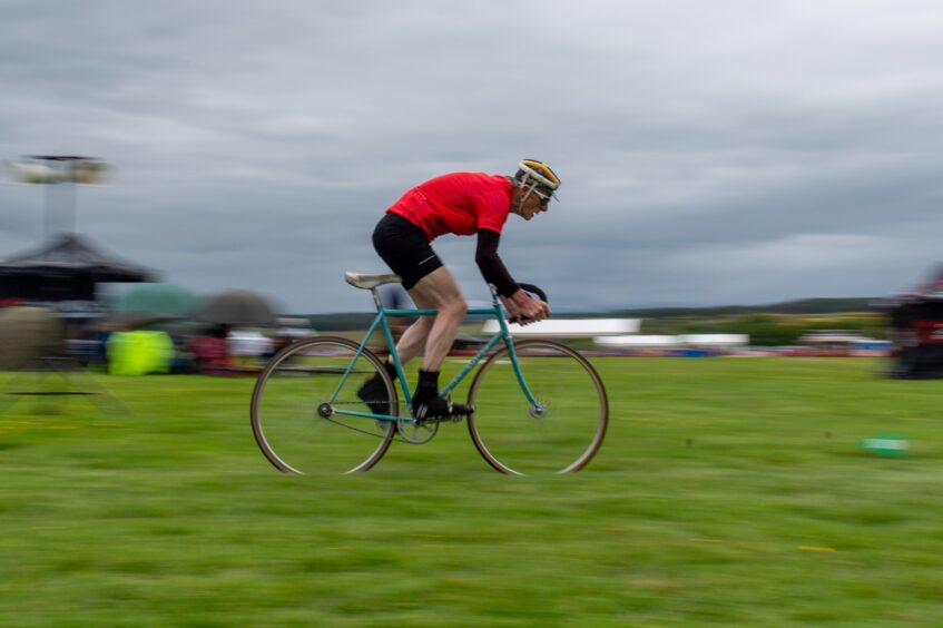 A cyclist racing