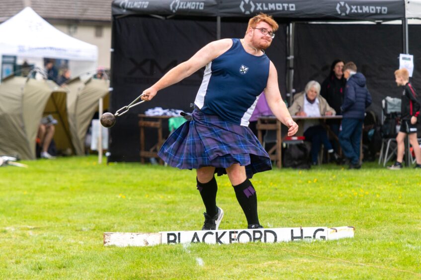 Jack Devanny competes in the Highland Games