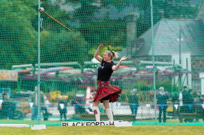 Liz Elliott throws a hammer at Blackford Highland Games
