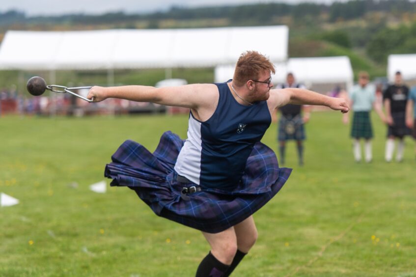 Jack Devanny competes wearing a kilt