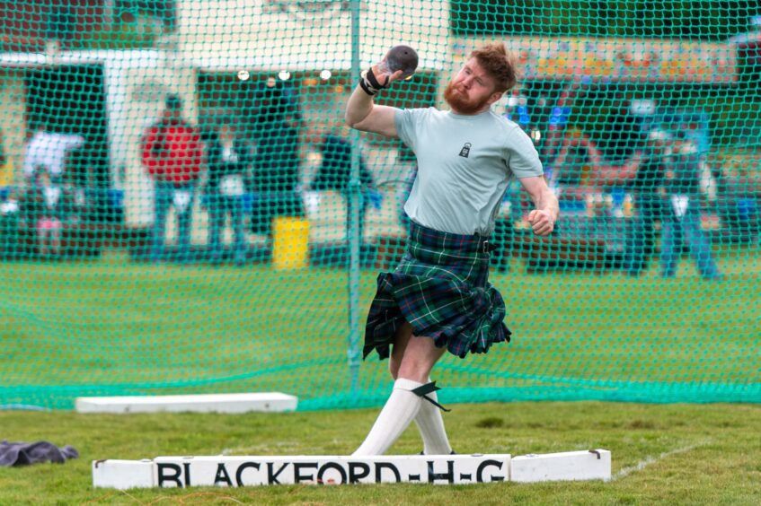 Andrew Murphie competes in the Shot Putt competition
