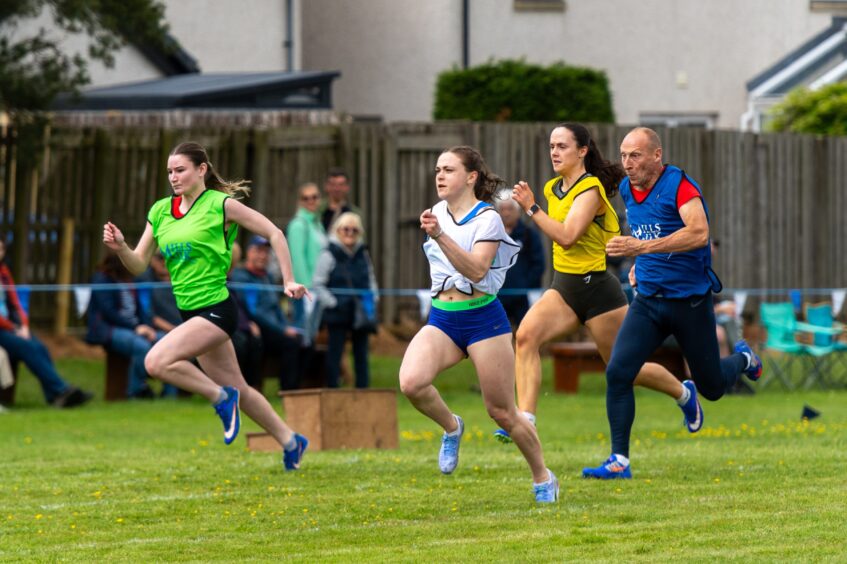 Adults running a race