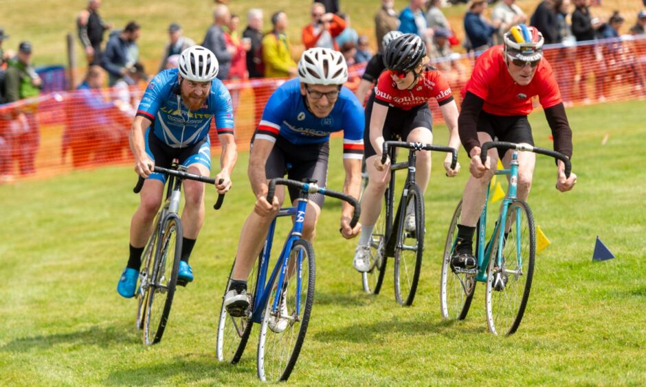 Four racers in a cycling race